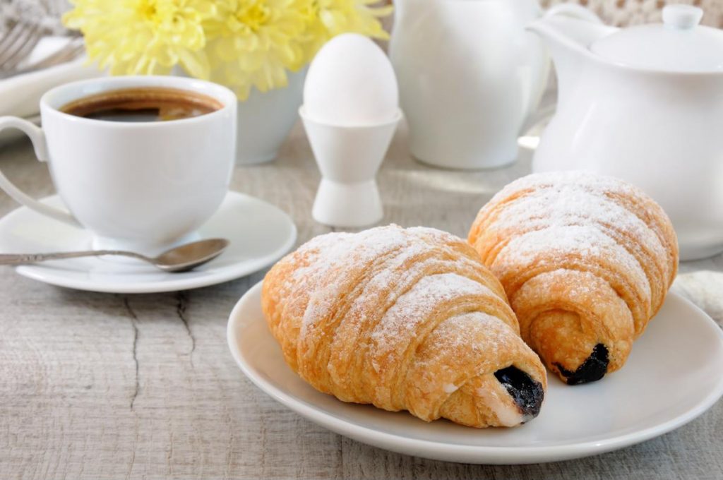 Croissants filled with dark chocolate will be sure to satiate your customers' sweet tooth.