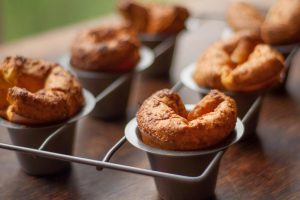 Get popovers out of the tin fast or they could lose their shape.